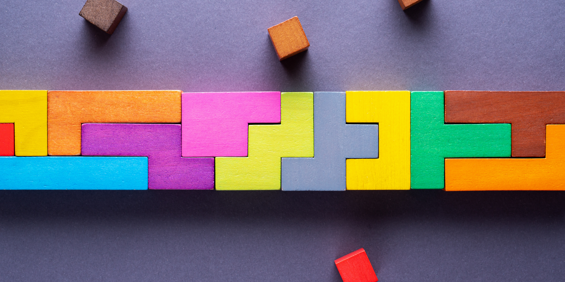 Banner image showing multi-coloured puzzle pieces connected together